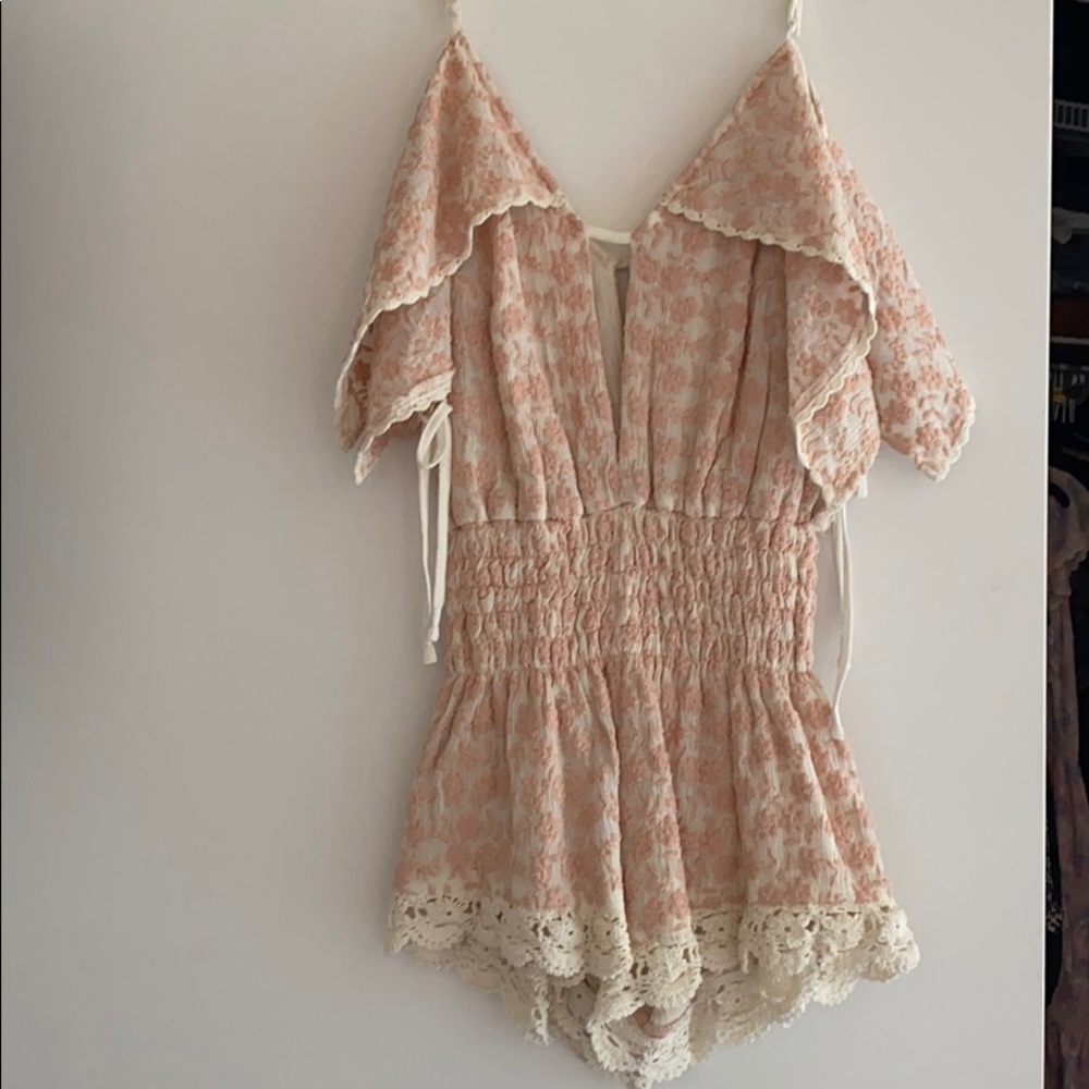 Pink flowered romper